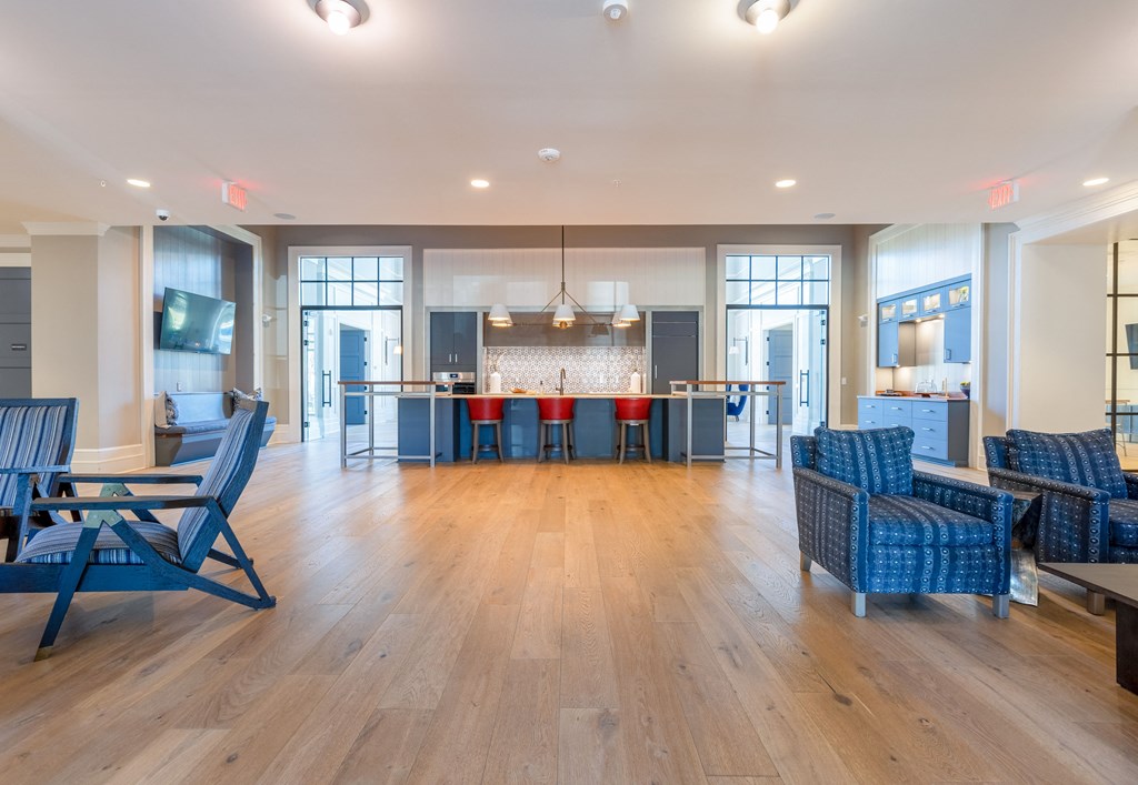 clubroom with ample seating and a full kitchen