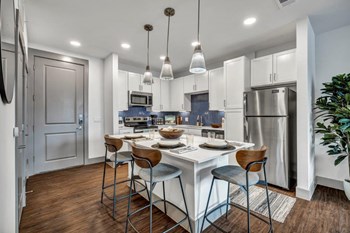 Nexus East Kitchen with Ample Storage and Island - Photo Gallery 16