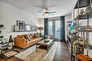 Nexus East Living Room with Private Patio and Hardwood Floors - Photo Gallery 3