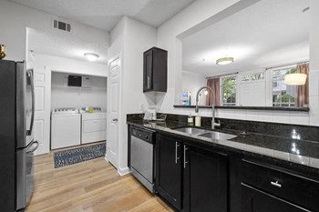 Kitchen With Washer Kitchen With Washer at Notting Hill, Atlanta, GA, 30346 - Photo Gallery 3