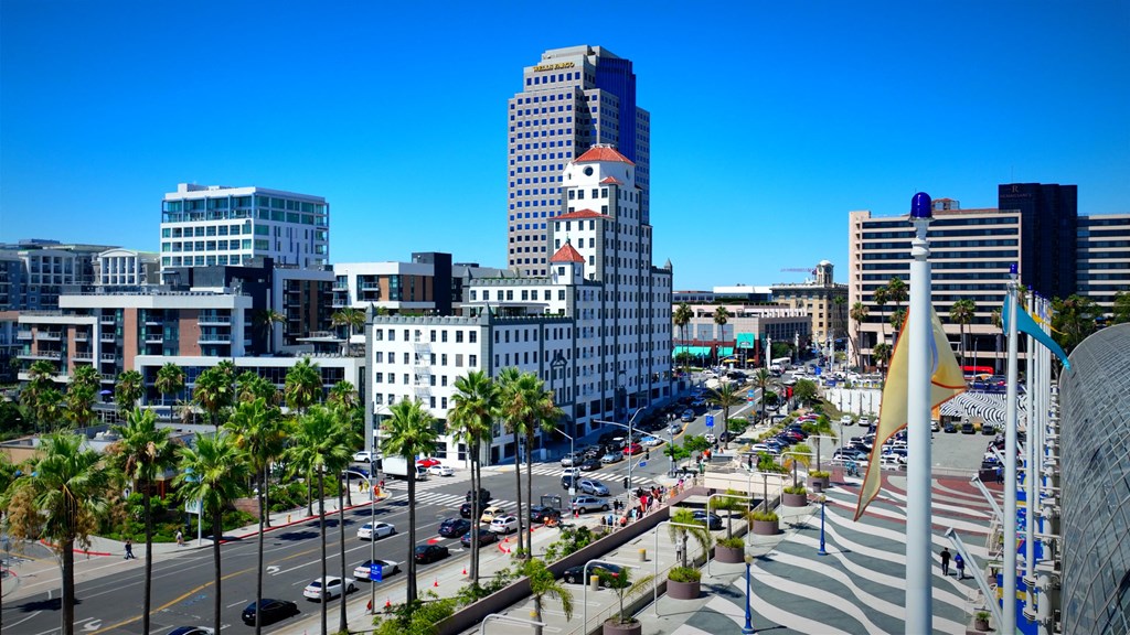 a view of the city with traffic and tall buildings