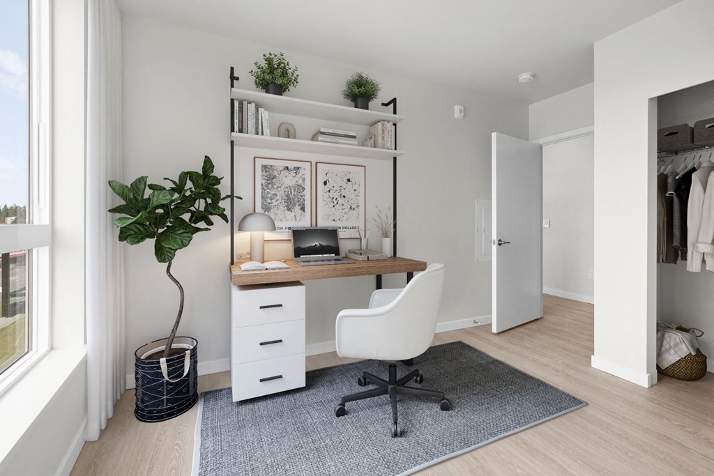a home office with a desk and a chair in a 555 waverly unit at Ion Town Center, Shoreline, 98133