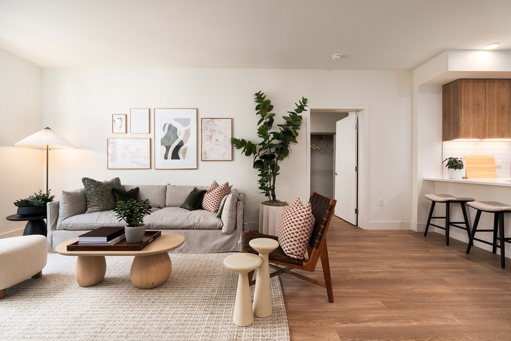 a living room with a couch and a table