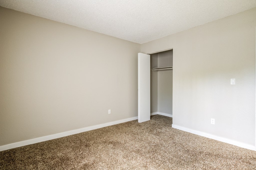 Bedroom with ample closet space