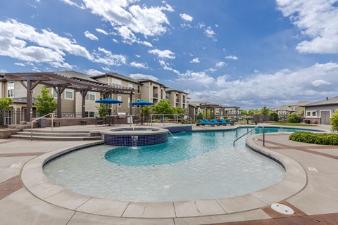 the preserve at ballantyne commons pool and amenities with apartment buildings