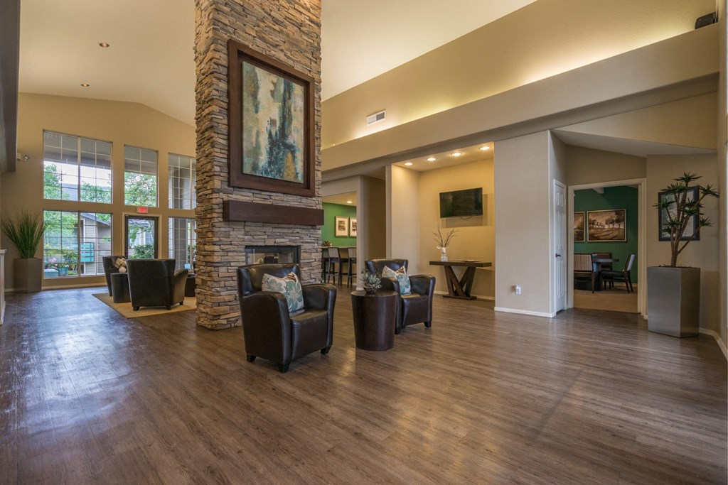 A Living Room With a Stone Fireplace at The Summit at Flagstaff, Flagstaff, AZ