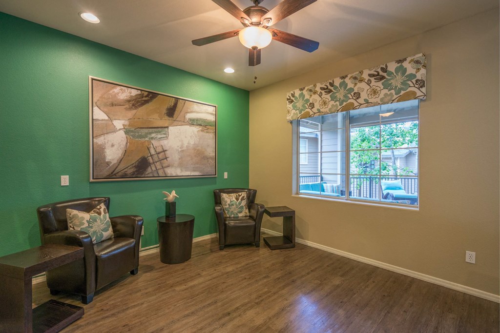 A Living Room With a Green Wall at The Summit at Flagstaff, Flagstaff, Arizona