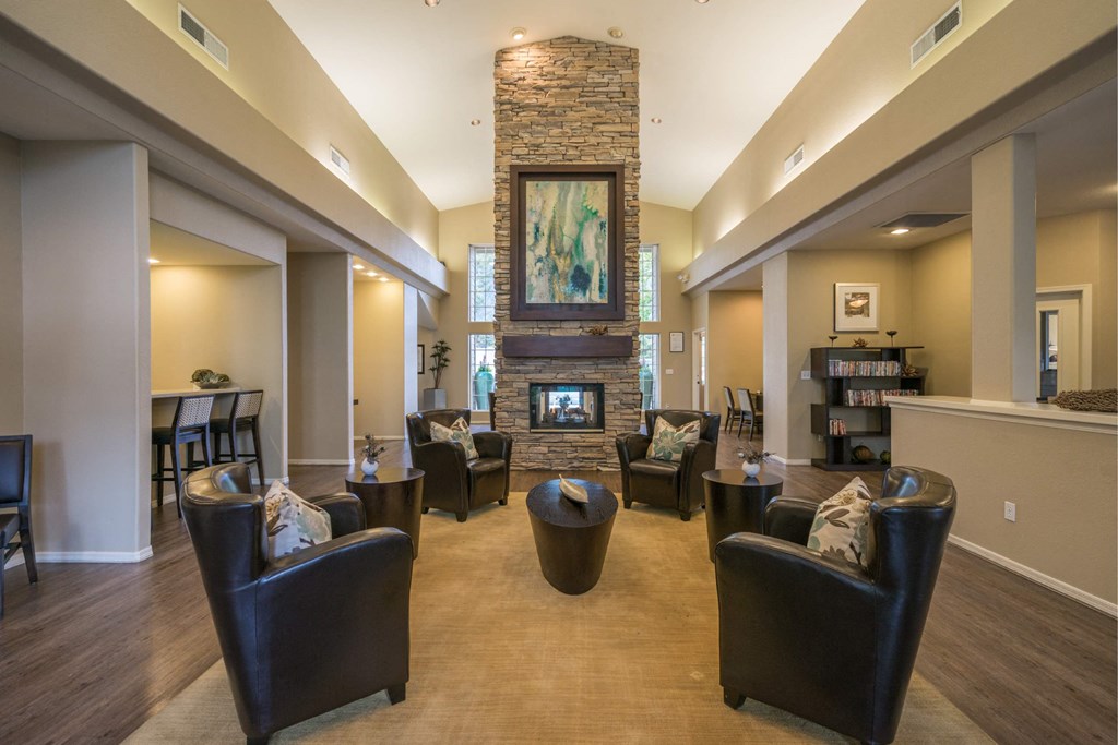 A Living Room With Leather Chairs at The Summit at Flagstaff, Flagstaff, AZ, 86004