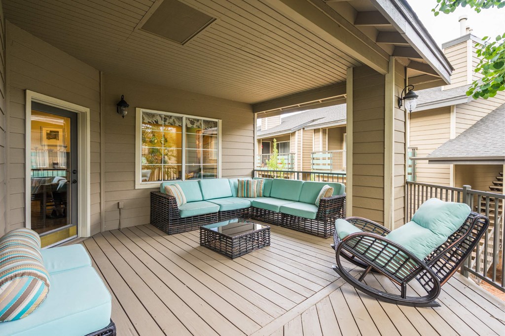 A Wooden Deck With Soda and Chairs at The Summit at Flagstaff, Arizona