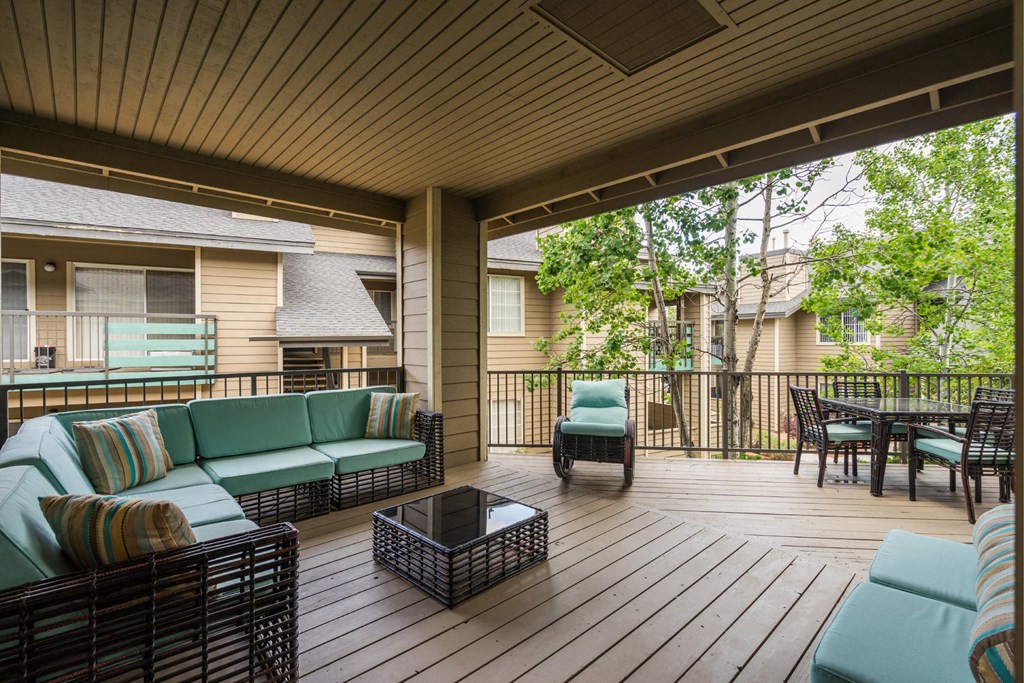 A Wooden Deck With a Sofa at The Summit at Flagstaff, Flagstaff, AZ, 86004