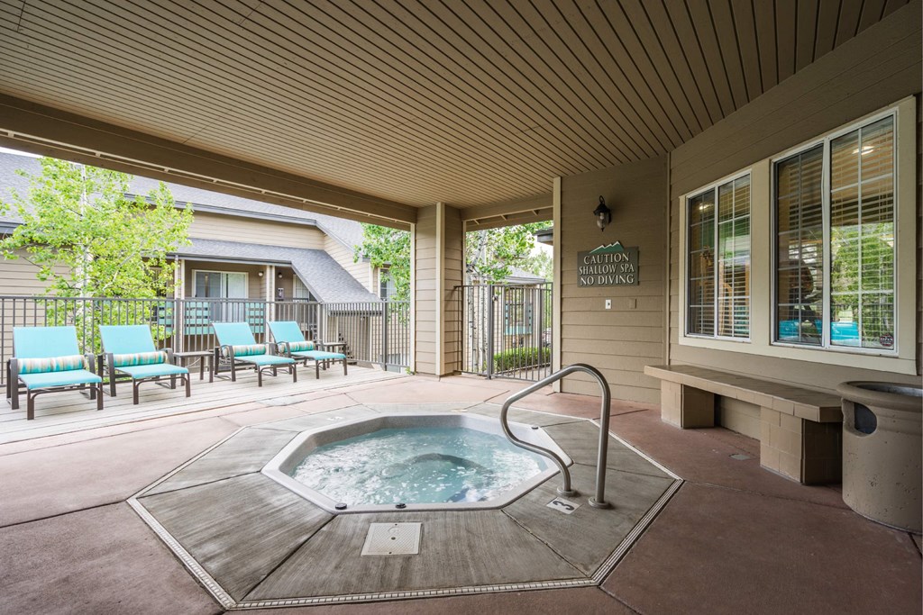 A Hot Tub is in the Middle of a Covered Patio at The Summit at Flagstaff, Flagstaff, Arizona