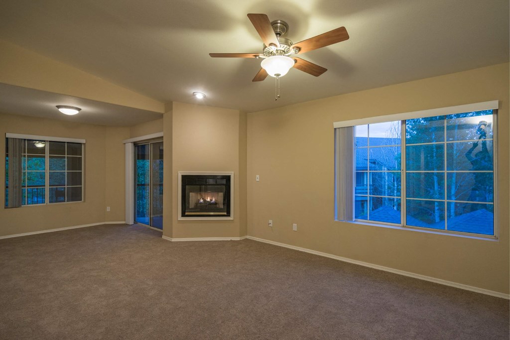 A Living Room With a Ceiling Fan at The Summit at Flagstaff, Flagstaff, AZ, 86004
