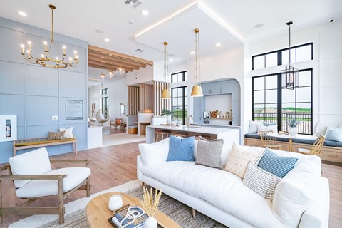 A modern living room with a white sofa and wooden furniture.