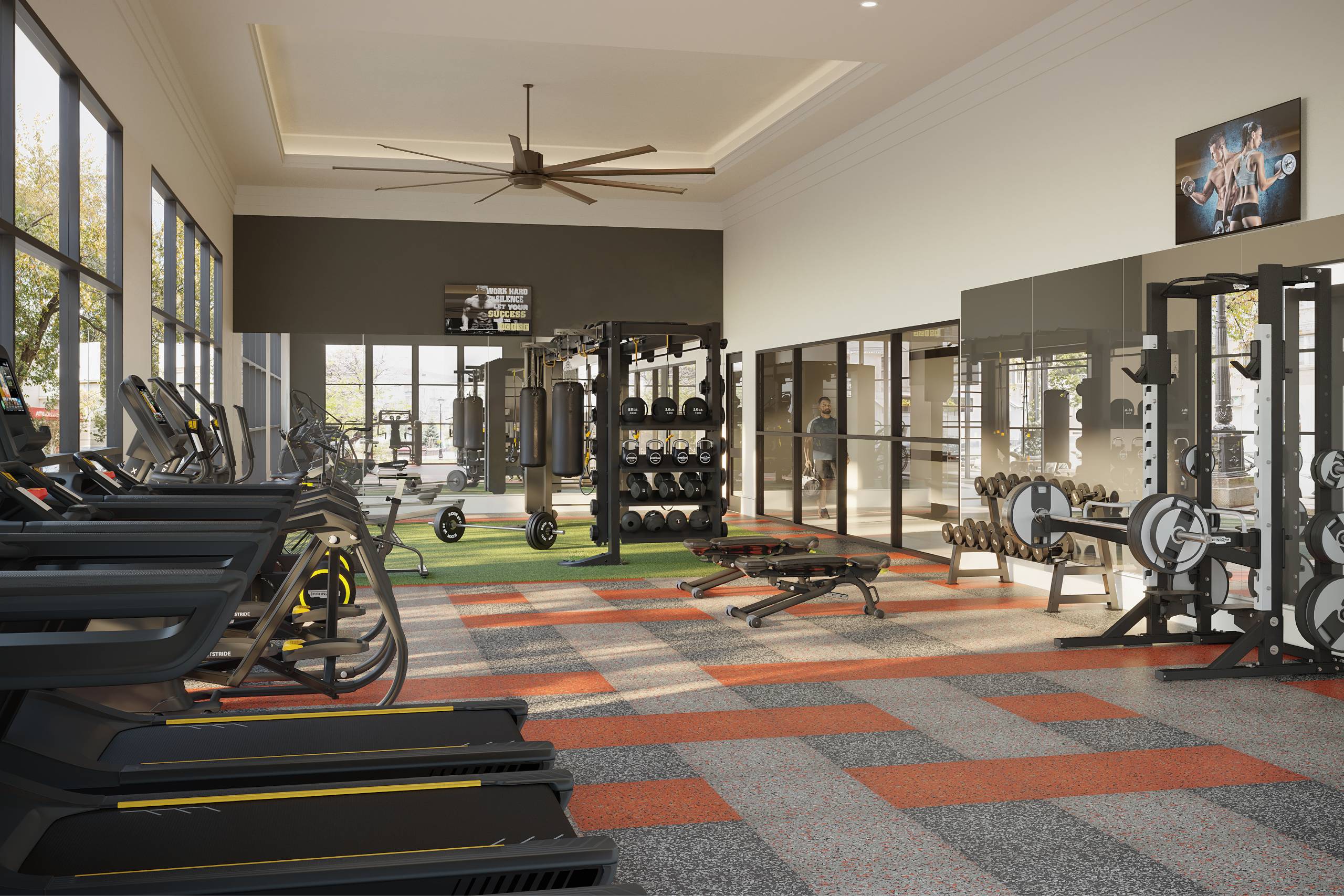 A gym with a variety of equipment including treadmills, weights, and a bench press.