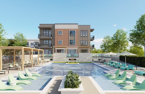 A modern building with a pool in front.