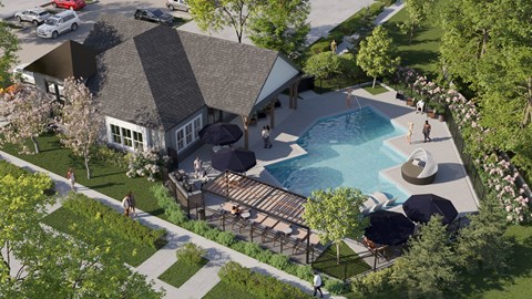 A pool surrounded by a deck and a small house.