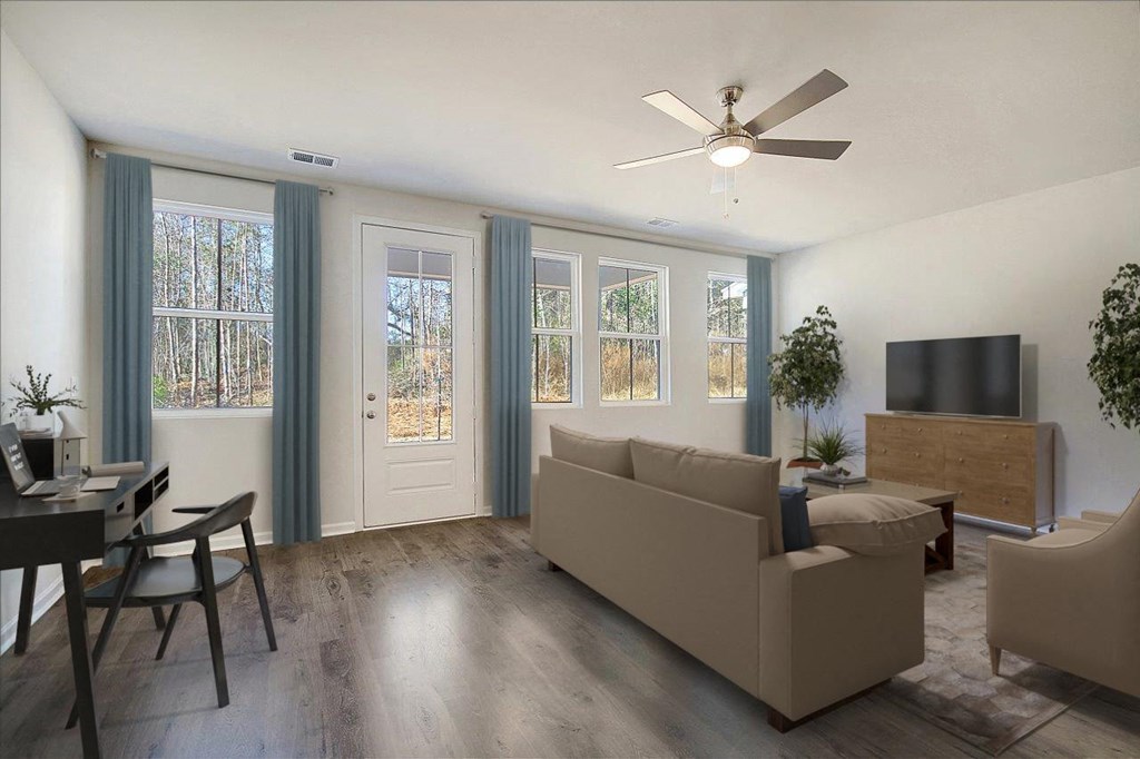 Living room area with seating and natural light (Virtually staged) at Berkeley Homes, South Carolina