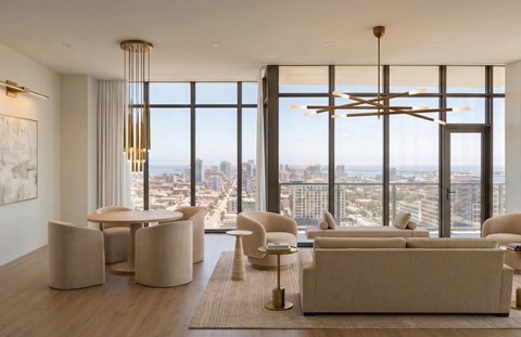 A modern living room with a view of the city.