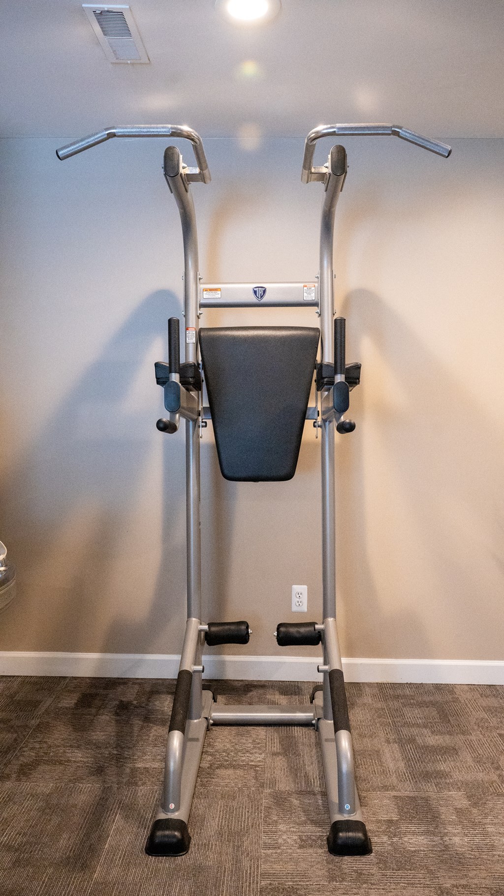 an exercise bike in the corner of a room