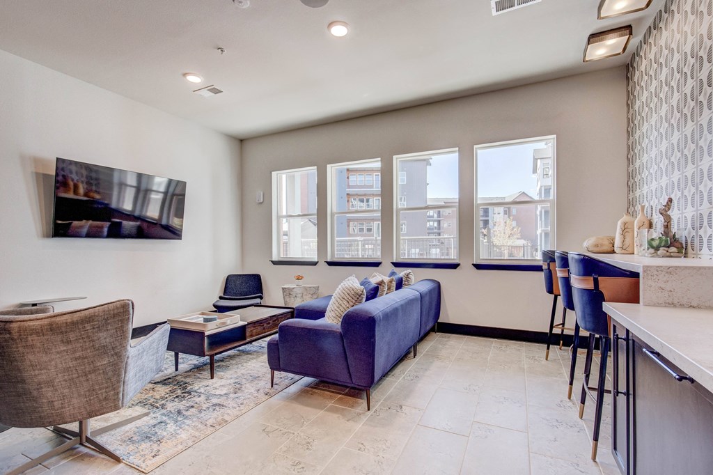 Business center with seating and TV