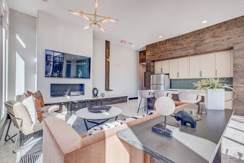 Sky deck social seating space with TV and indoor fire place