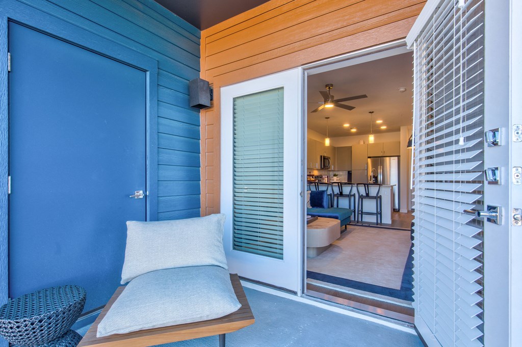 Patio with chair and french doors to living room