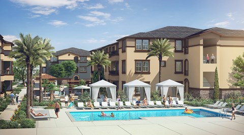 A swimming pool surrounded by palm trees and lounge chairs.
