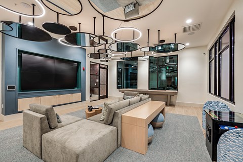 a living room with a couch and a television