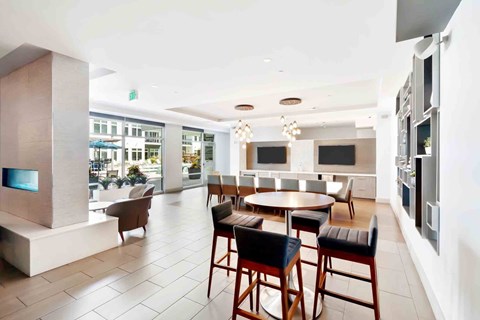 A modern dining area with a table set for four.