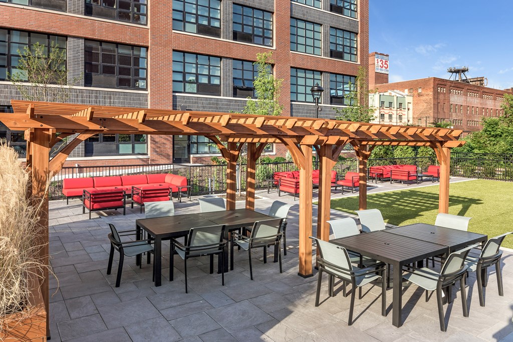 Outdoor green space for  lounging, games, and barbequing.