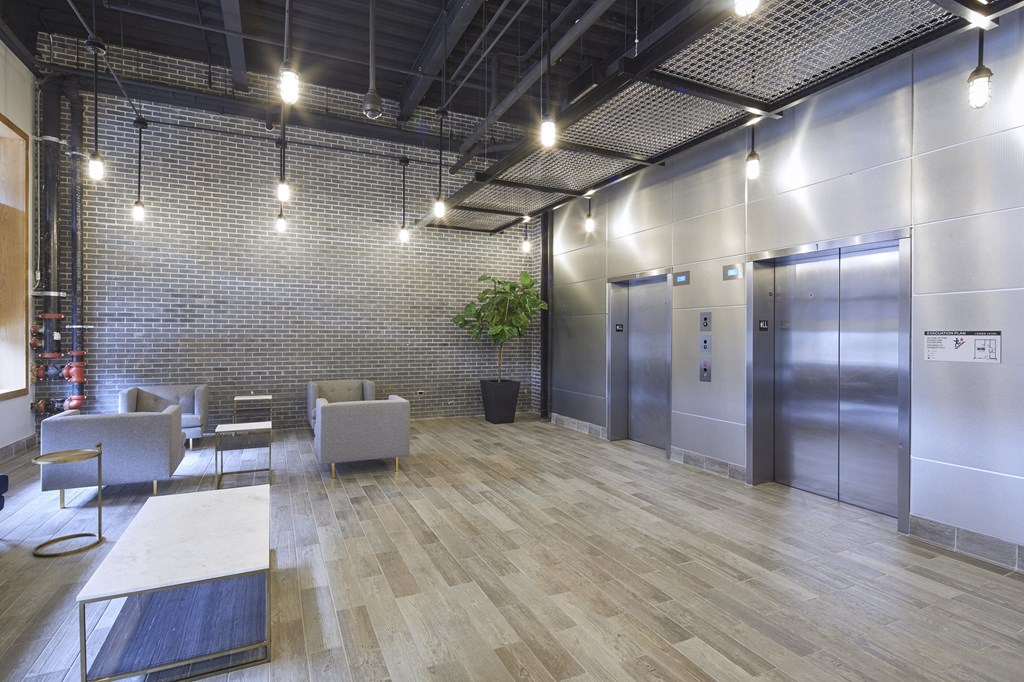 building entrance, lobby, and elevators.