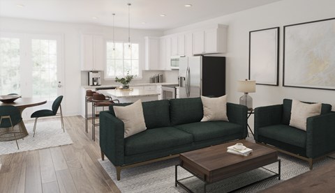 a living room with green couches and a coffee table