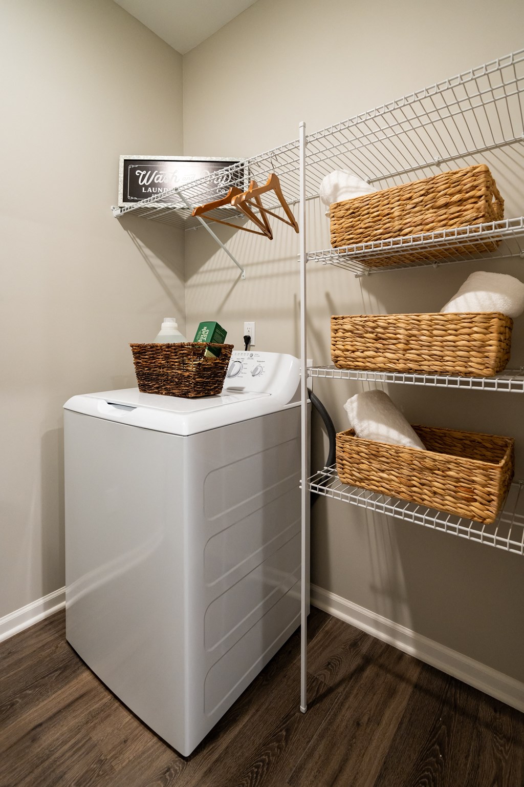a small laundry room with a washer and dryer