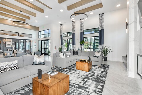 a living room with couches and a coffee table