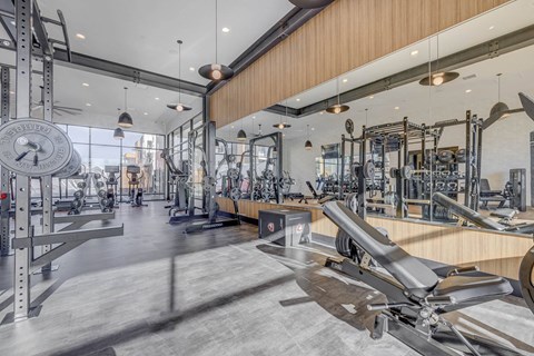 a gym with weights machines and other exercise equipment