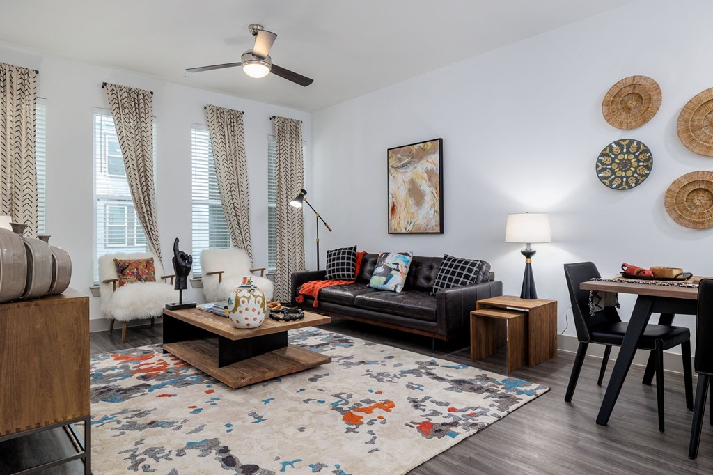 a living room with a couch and a table