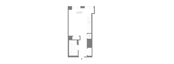 A floor plan of a living development with a living room, a kitchen, a bathroom and a toilet.
