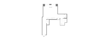 A floor plan of a building with a kitchen, living room, and two bedrooms.