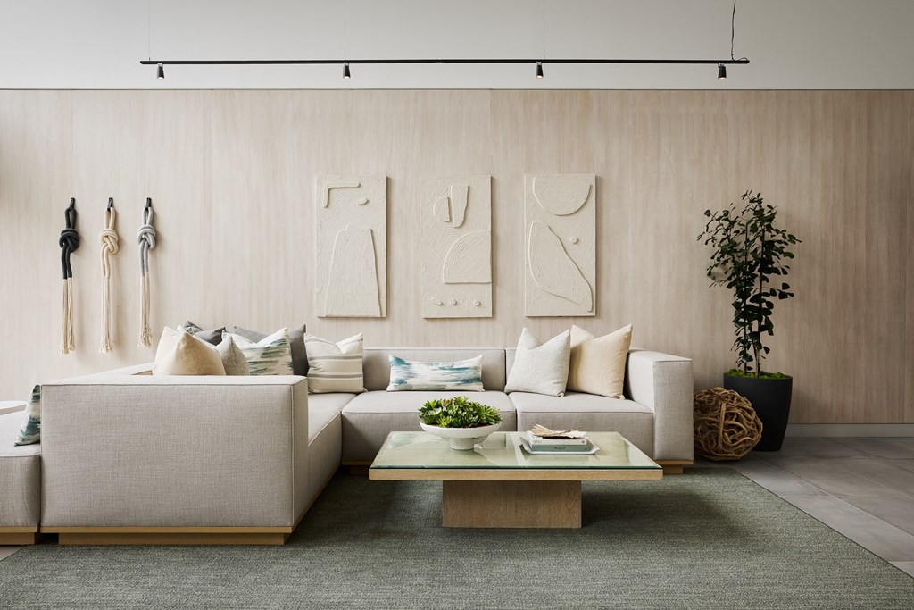 a living room with a large couch and a coffee table