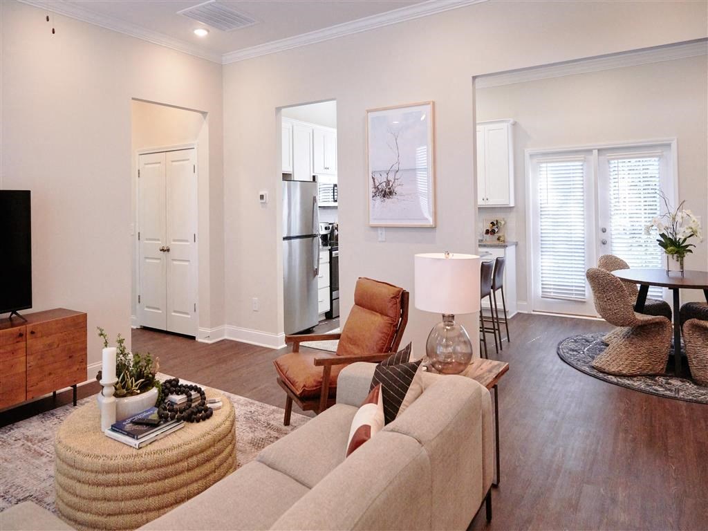 a living room with a couch and a chair