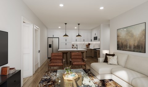 A modern living room with a white couch, a glass coffee table, and a large painting on the wall.