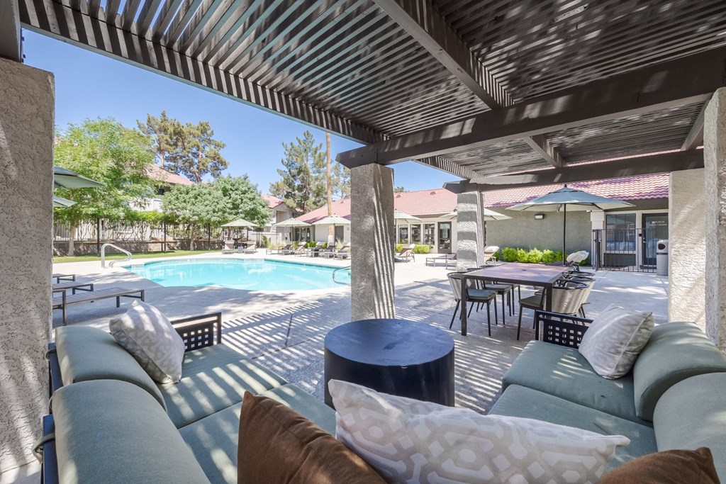 Shaded seating area near pool