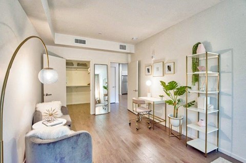 a living room with a couch and a table