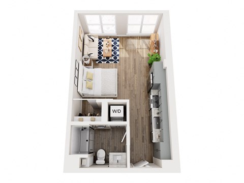 A small apartment with a bedroom, bathroom, and kitchen.