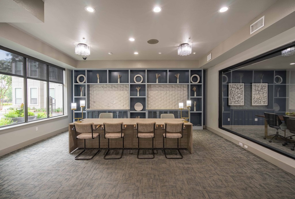 leasing office with a long table and chairs