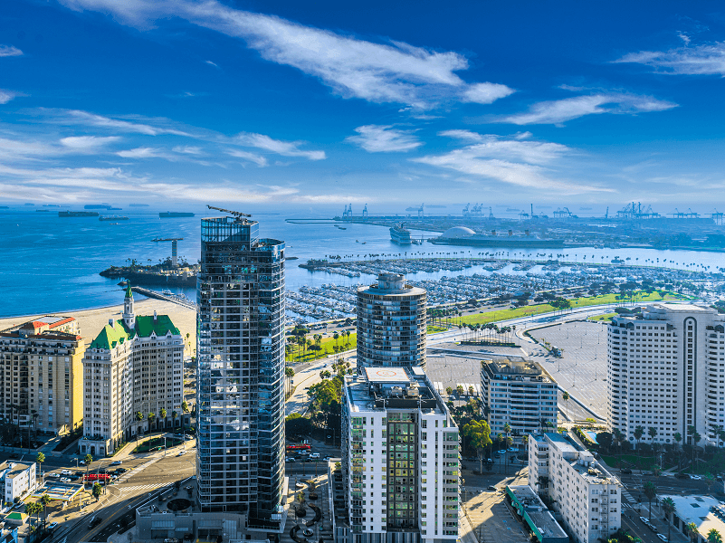 a cityscape of tel aviv with the beach in the background