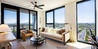 a living room with a couch and a table