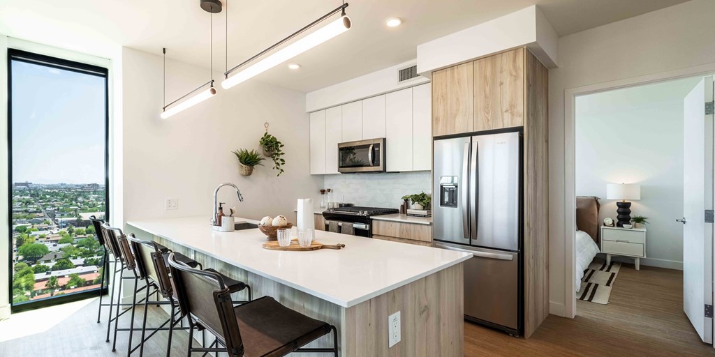 a kitchen with a large center island