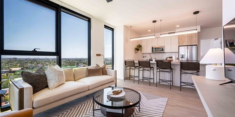 a living room with a couch and a table