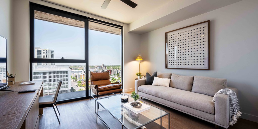 a living room with a couch and a table